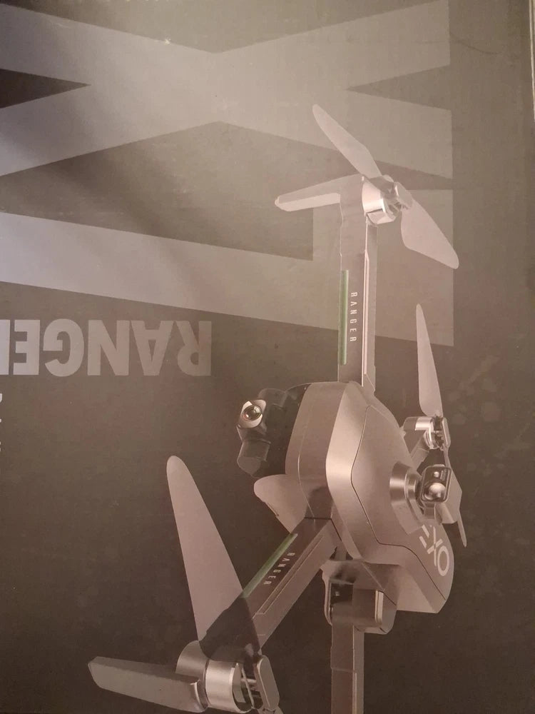 Tucok 011RTS quadcopter drone with 4K camera, four propellers, white and gray