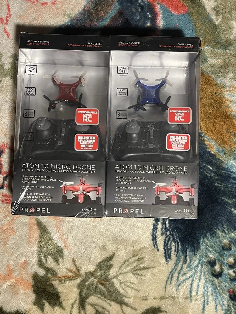 Propel Atom 1.0 micro quadcopter drone 2-pack in retail boxes, red and blue