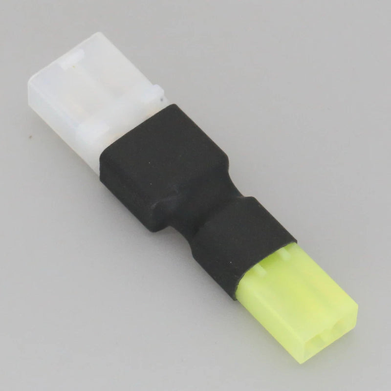 RC battery adapter with male Tamiya plugs; black body, white housing, green connector