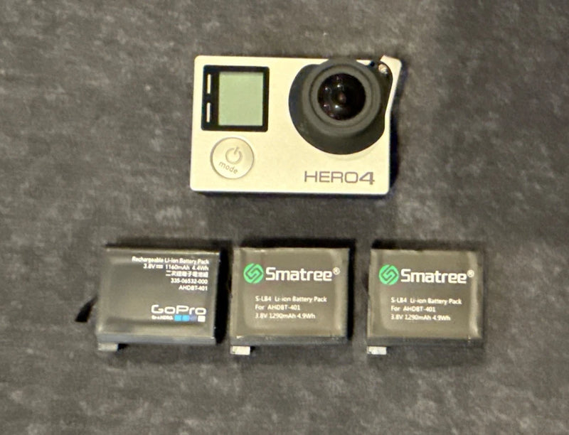 GoPro HERO4 action camera with lens and 3 Smatree battery packs