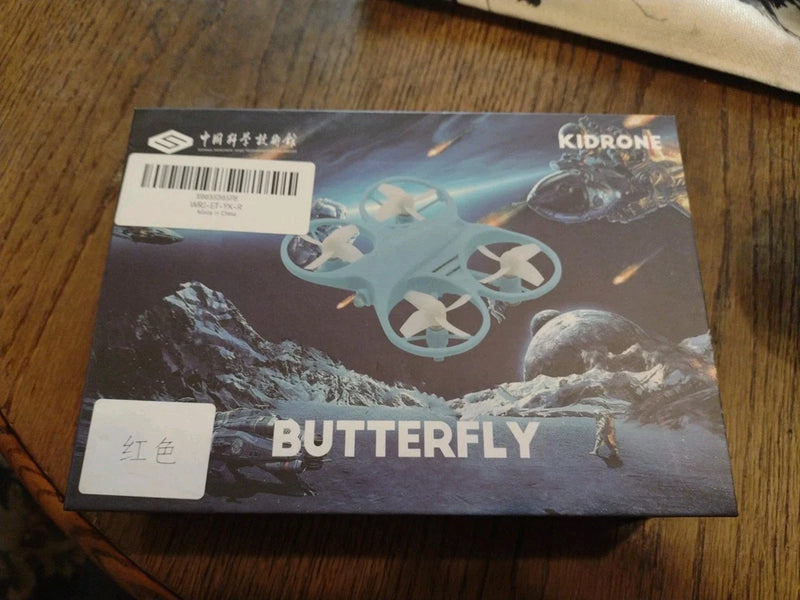 Kids Butterfly drone box with Kidrone logo and quadcopter illustration