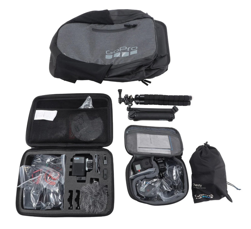 GoPro action camera bundle with black zip case, tripod grip, and chest mount