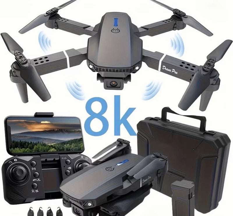 Quadcopter drone with camera gimbal, remote controller, and hard carrying case