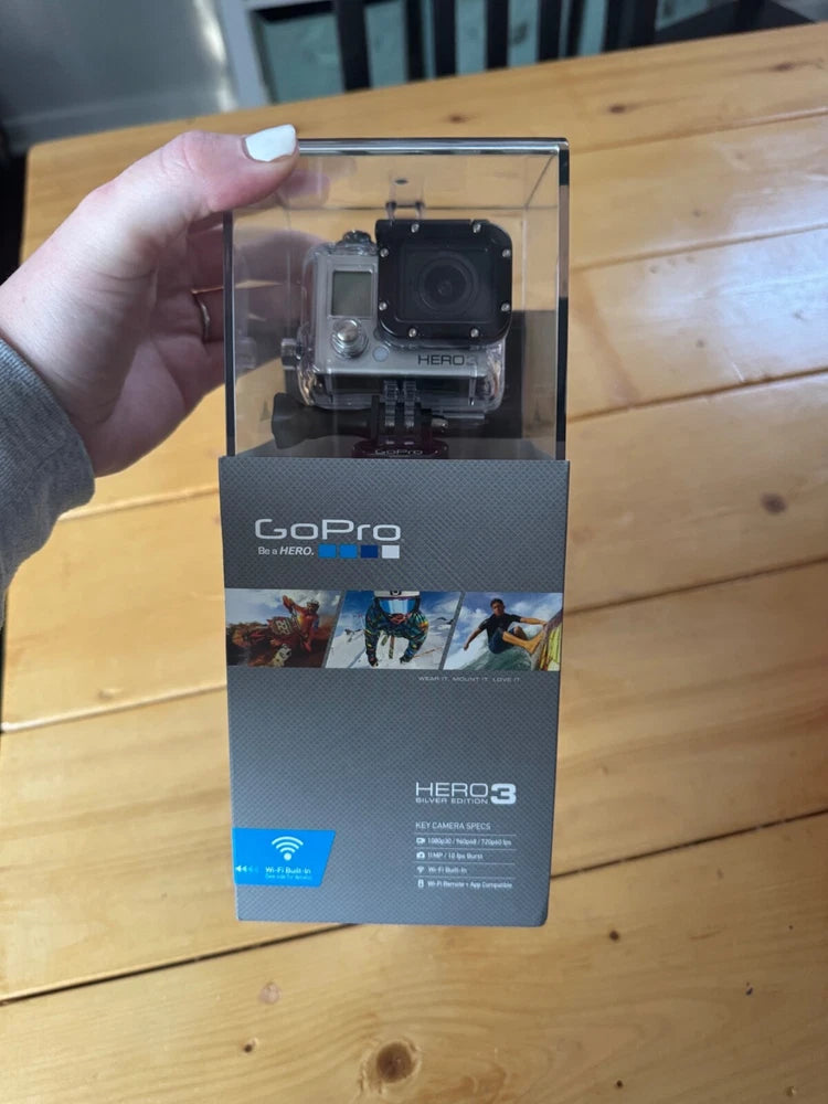 GoPro HERO3 silver action camera box with camera in clear cover