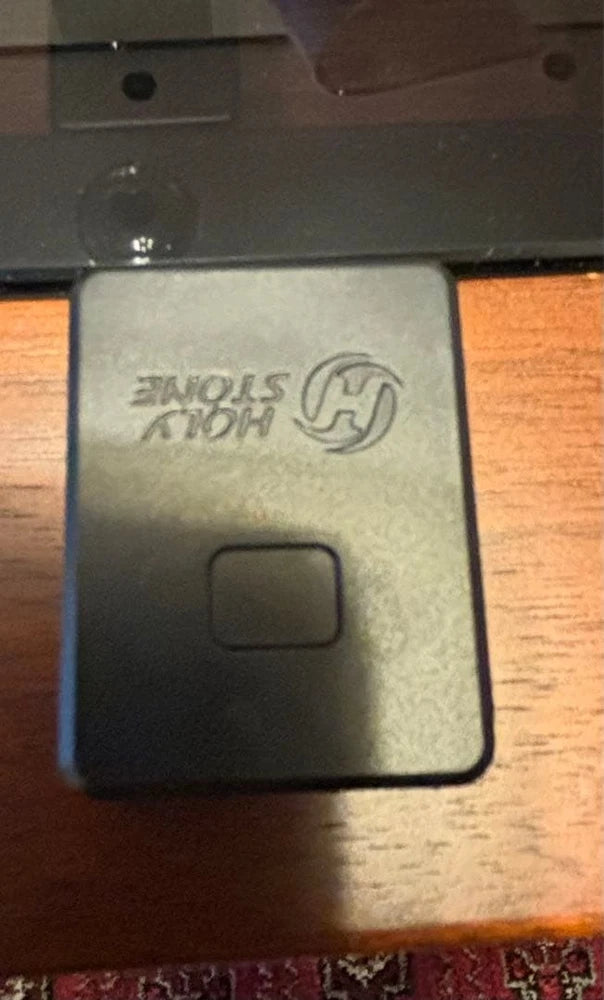 Rectangular external remote ID module, dark gray with logo and square port