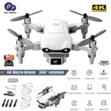 Light gray mini foldable quadcopter drone with front camera and four rotors