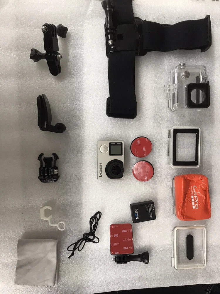 Action camera accessories kit with case, mounts, batteries, and protective frames