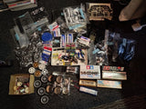 Assorted RC model battery charger and spare parts set with wheels, electronics, and bags