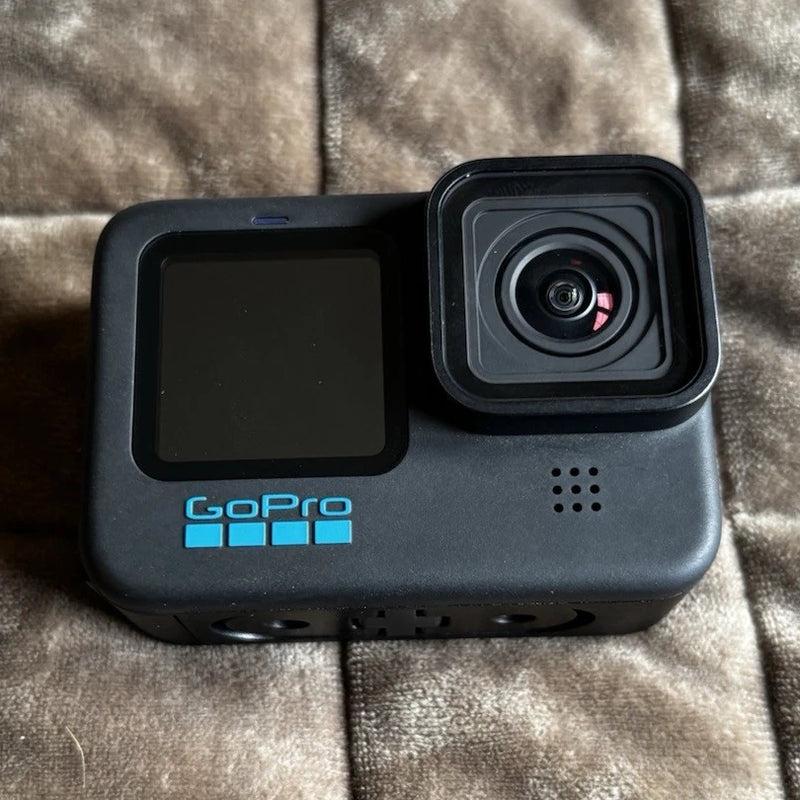 GoPro HERO10 action camera in black, front screen and wide lens with case