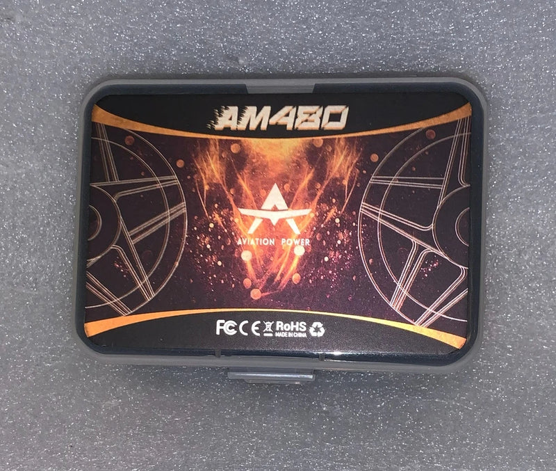 AM430 brushless outrunner motor with orange/gold power logo and mounting face