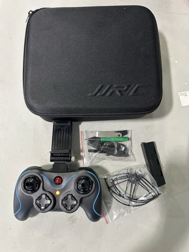 Foldable drone optical flow controller with hard case, gamepad grips and accessory cables