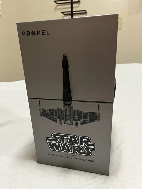 Star Wars T-65 X-Wing drone retail box with Star Wars logo and schematic graphics