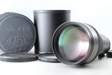 Tokina AT-X SD telephoto camera lens with hood and front/back caps, Nikon F mount