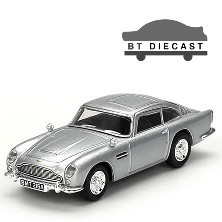 Silver die-cast Aston Martin DB5 model car with opening doors and detailed wheels