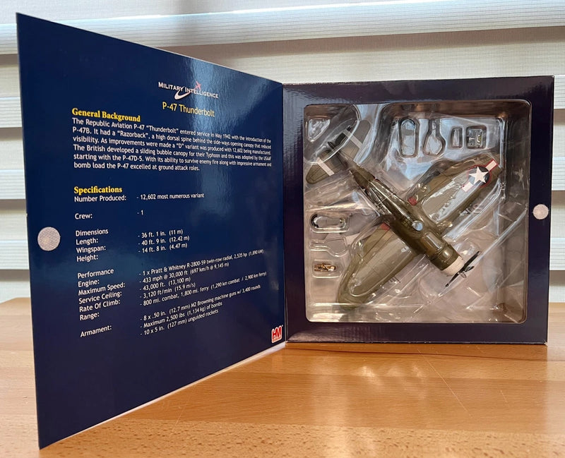 Boxed P-47 Thunderbolt model aircraft with clear plastic display tray