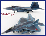 Blue-gray sea-camouflage F-22J model jet with extended landing gear