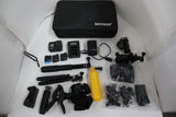 GoPro Hero 8 black action camera accessory kit with case, mounts, batteries, and clips