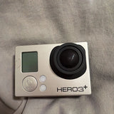 GoPro HERO3+ action camera front with black lens and small status screen