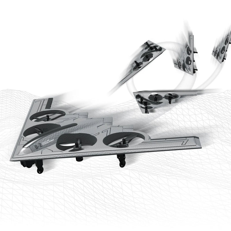 Gray stealth bomber RC plane with wings and landing gear, multi-rotor props