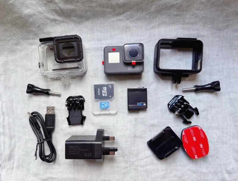 GoPro HERO6 Black action camera kit with waterproof housing, mount accessories, charger