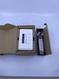 RC LiPo charger/discharger kit in open box, showing white charger module and red battery pack