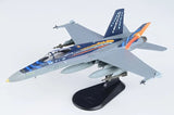 Gray F/A-18A Hornet model aircraft with colorful markings on display stand