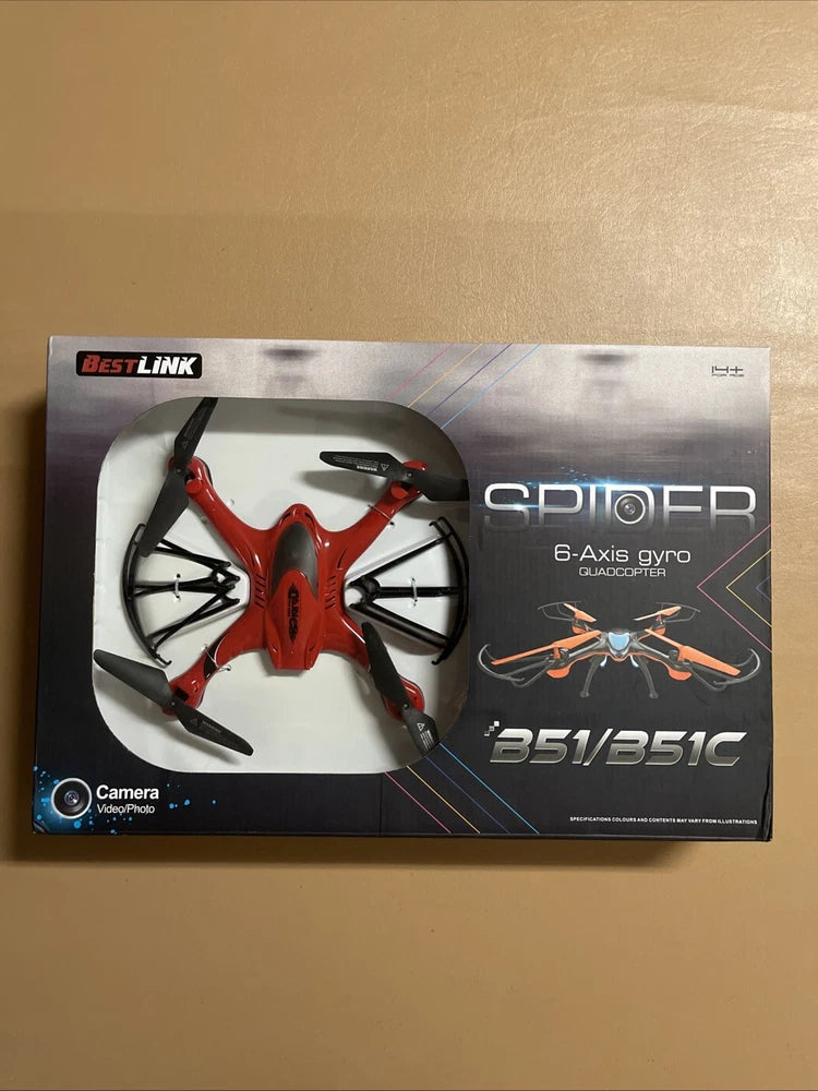 Red 6-axis gyro quadcopter drone with video camera in retail box