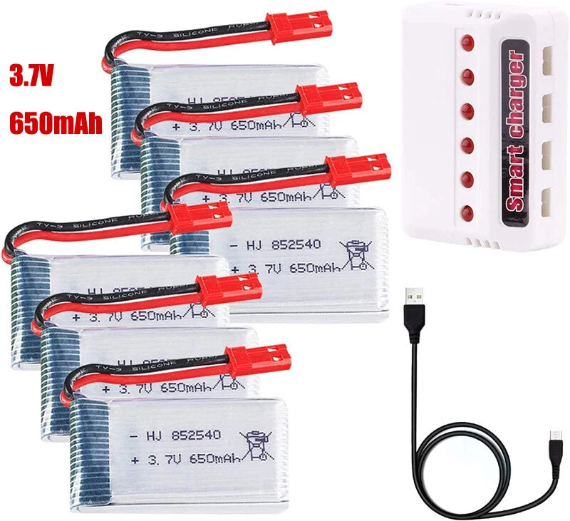 Set of LiPo RC batteries with red JST connectors and white smart USB charger