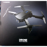 Foldable dark quadcopter drone with four propellers and camera on front body