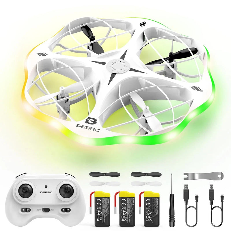 White DEERC D13 quadcopter drone with controller, three batteries, and charging cables