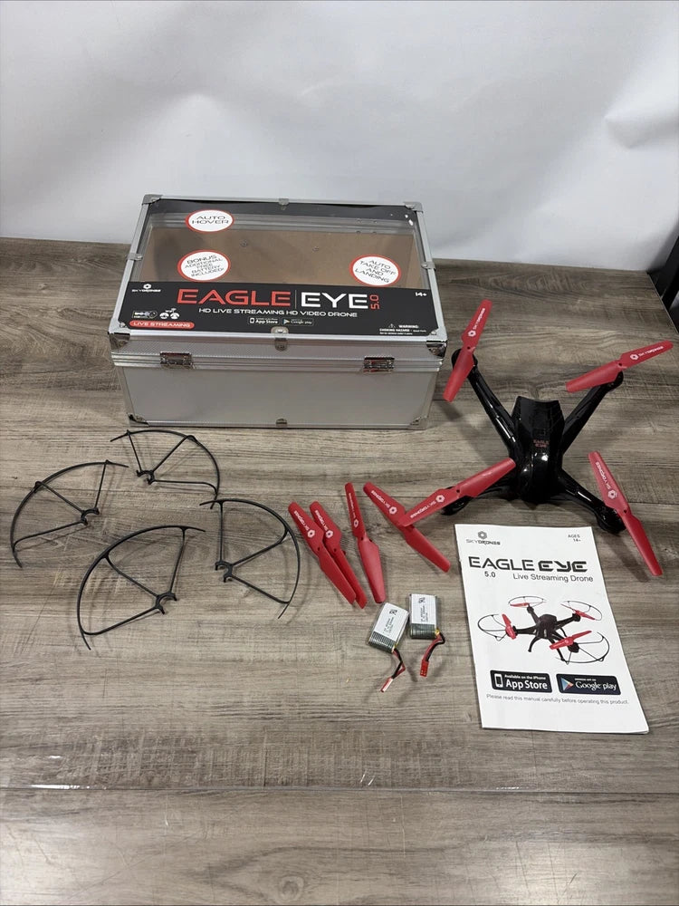 Drone accessory kit: red propellers, controller module, and hard storage case