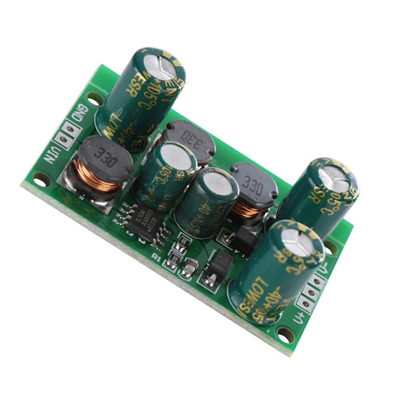 DC boost converter module PCB with green board, inductors and electrolytic capacitors