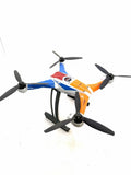 Blue and orange quadcopter drone with four propellers and landing stand