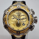 Men's round chronograph wristwatch with gold dial, silver case, and black leather strap