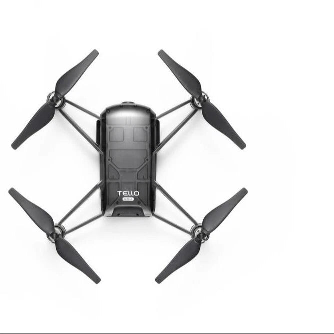 Black mini quadcopter drone with four propellers and central camera body