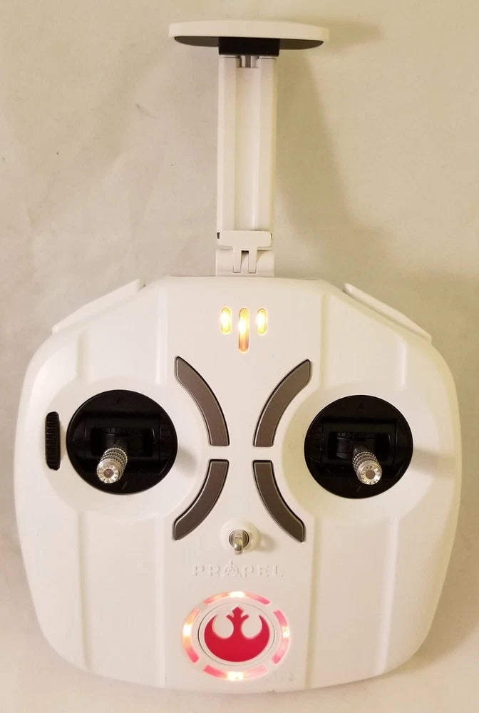 White Star Wars X-Wing drone remote controller with two black joysticks and red emblem