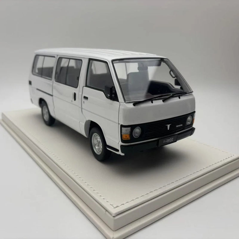 1:18 scale white van model car with detailed front grille and headlights