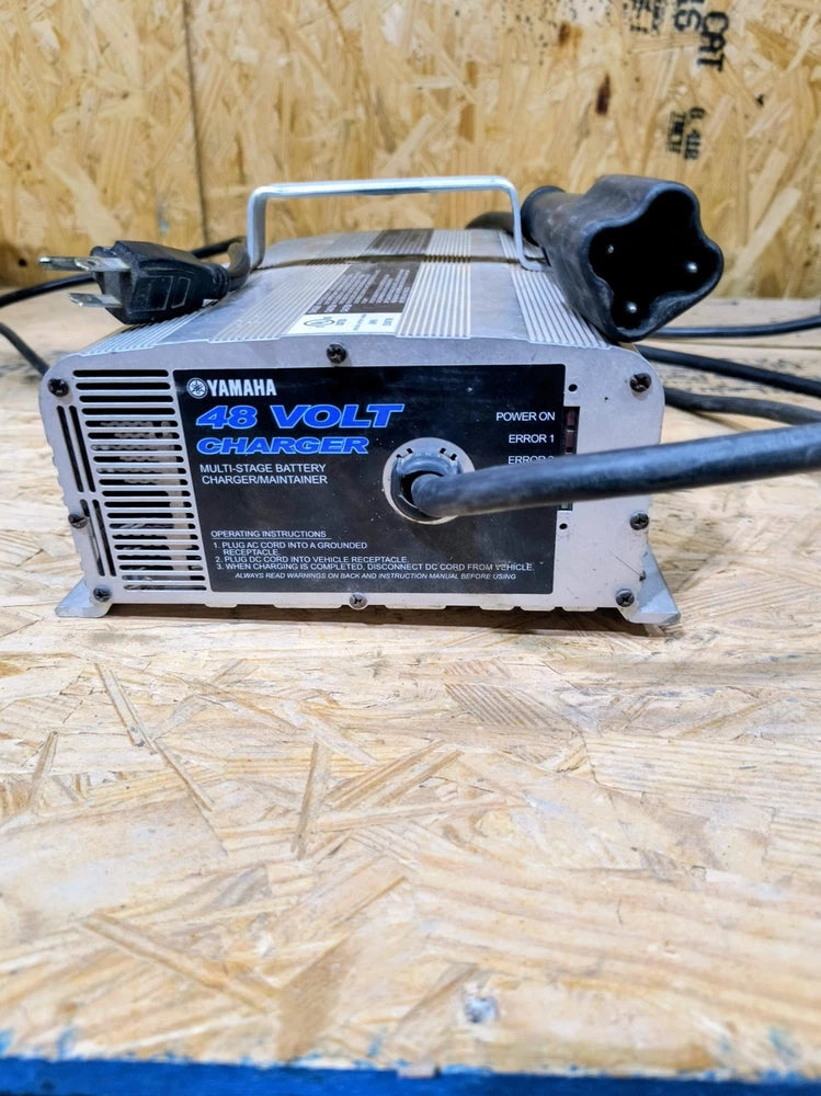 Yamaha 48-volt golf cart battery charger with three-pin plug and front panel label