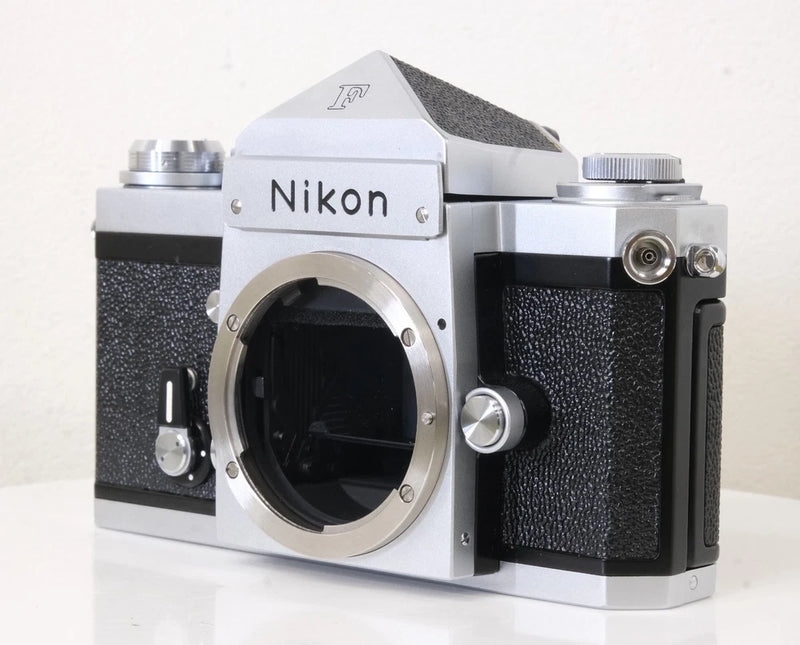 Nikon F eye-level SLR 35mm camera body, silver top and black textured grip