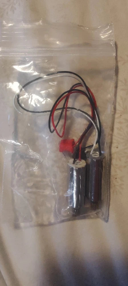 Drone motor replacement set with red/black wires, two cylindrical motors