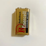 Gold RadioShack Enercell 9V alkaline battery with metal top terminals