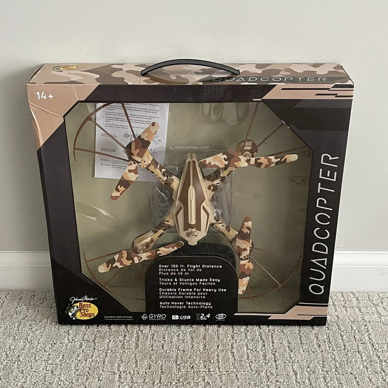 RC quadcopter drone in tan desert camo, shown in retail packaging