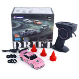 1:43 RC drift mini car set: pink car, black controller, red cones, spare wheels