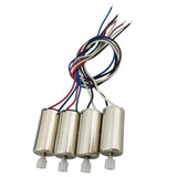 Set of four electric motors with wired leads and mounting bases