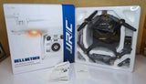 Black JJRC H68 aerial drone with 4 rotors in retail box tray