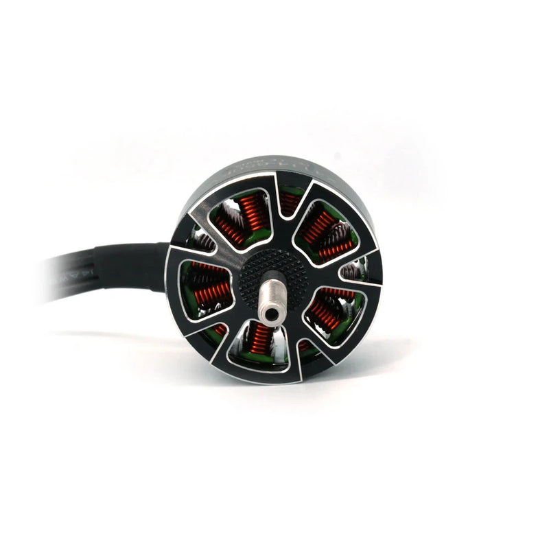 Brushless FPV motor with black housing, colorful stator, and wire leads