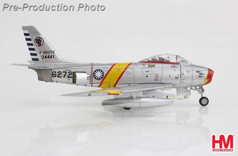 1:72 F-86 Sabre model jet in white and gray, side view with red nose
