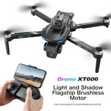 Foldable quadcopter drone with dual HD camera, dark gray frame and 4 propellers, with controller