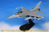 Gray 1:72 F-16V fighter jet model with landing gear on black display stand