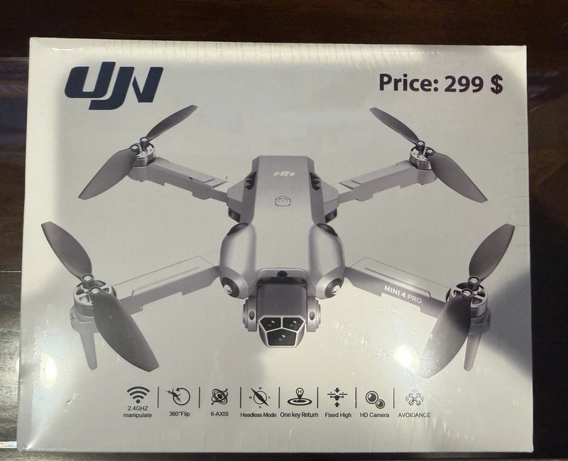 UJN mini 4 Pro quadcopter drone with 4K camera on retail box
